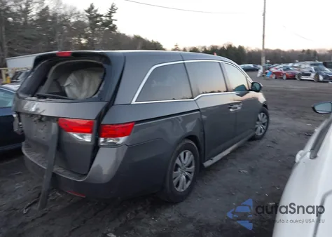 2014 Honda Odyssey Ex-L z USA, uszkodzony, nr VIN 5FNRL5H66EB064735